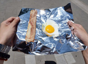 北京最高温破38度 记者实验发现80分钟烤熟鸡蛋