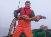 山东渔民捕获1.86米巨型“鳝鱼王”